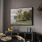 Landscape at Lake Starnberg, 1890 by Edward Theodore Compton in a black floater framed canvas featuring a natural setting with water, trees, and open sky, displayed above a desk in a dark home office interior.