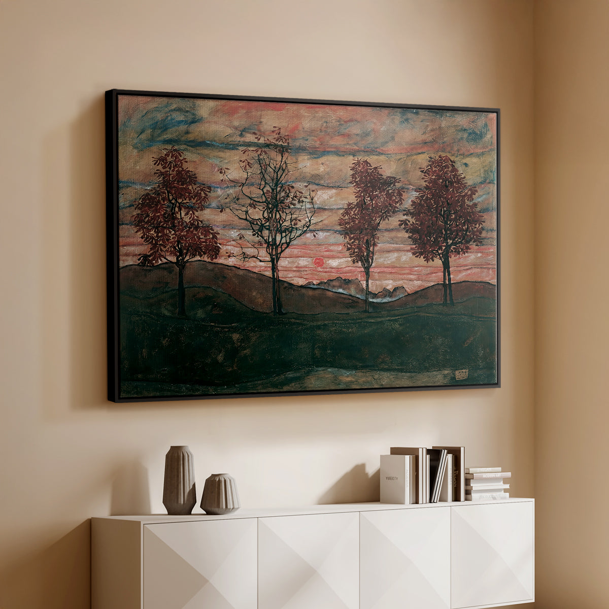 Black floater framed canvas of Four Trees, 1917 by Egon Schiele, featuring a minimal landscape with grouped trees and expressive color above a console cabinet in a minimalist entryway.