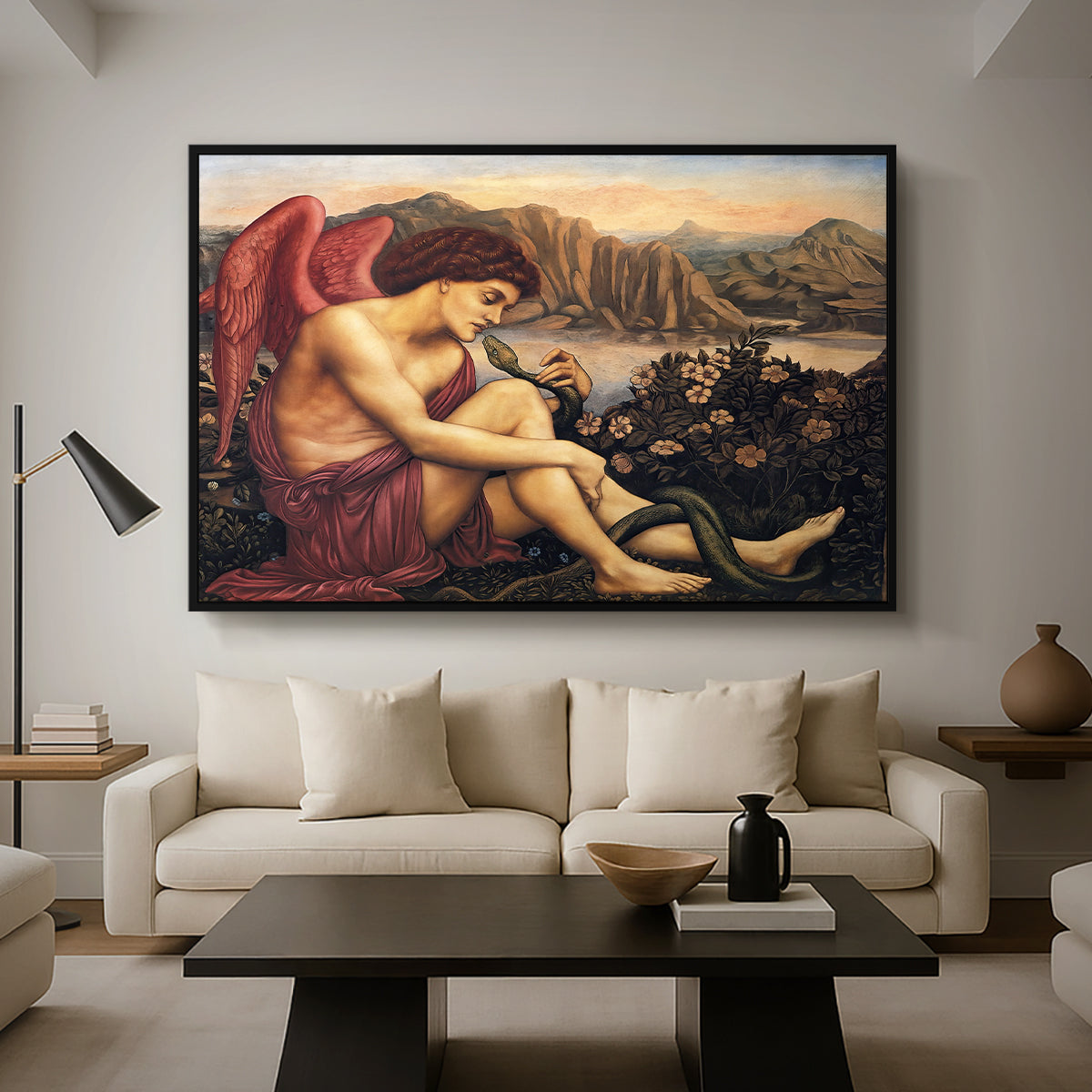 The Angel with the Serpent, c. 1870-1875 by Evelyn De Morgan as a black floater framed canvas featuring an angelic figure confronting serpent in symbolic battle of good and evil, displayed above a sofa in a modern living room.