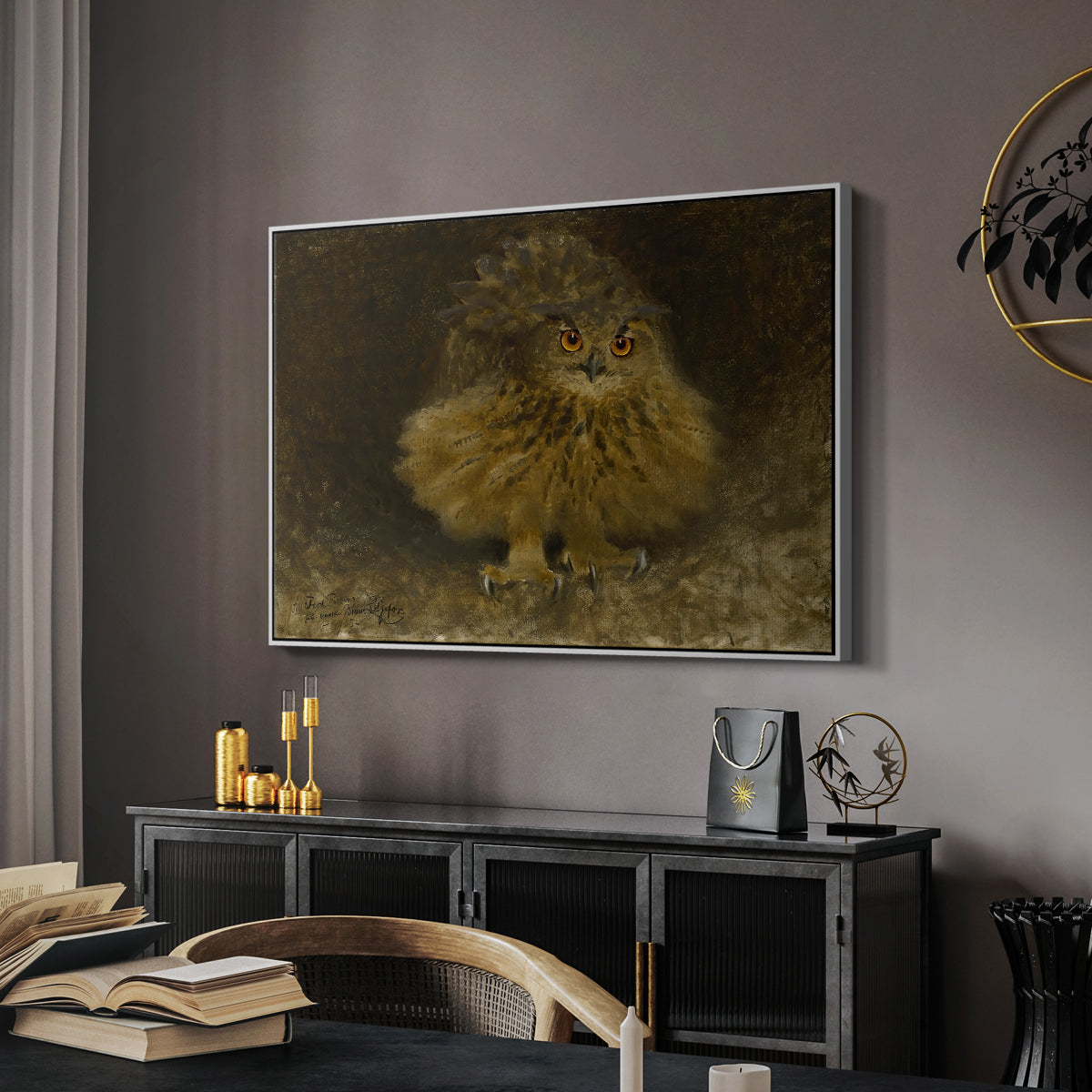 An Eagle Owl (Berguv), 1905 by Bruno Liljefors in a white floater framed canvas featuring a bird of prey resting on tree branch with textured feathers, displayed above a desk in a dark home office interior.