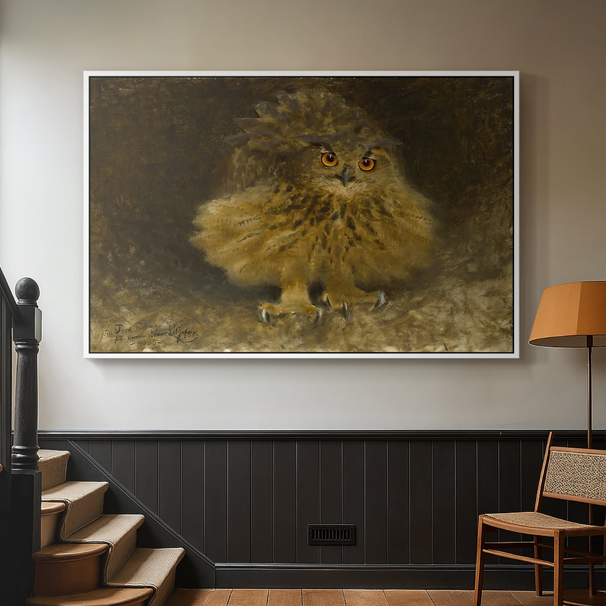 White floater framed canvas featuring a realistic depiction of owl camouflaged within woodland environment, displayed in a hallway near a staircase.