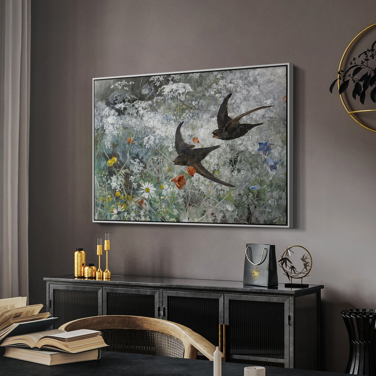 Common Swifts, 1886 by Bruno Liljefors in a white floater framed canvas featuring a multiple birds flying together in natural outdoor scene, displayed above a desk in a dark home office interior.
