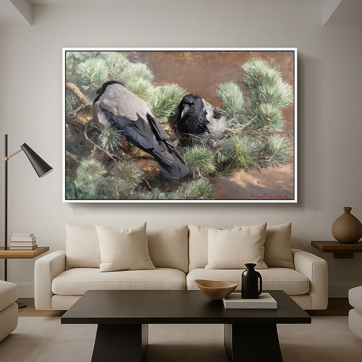 Hooded Crows (Kråkor), 1891 by Bruno Liljefors as a white floater framed canvas featuring two crows perched on ground among grass and earth tones, displayed above a sofa in a modern living room.
