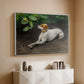 White floater framed canvas of Portrait of a Dog, 1891 by Bruno Liljefors, featuring a realistic portrait of a resting dog with attentive expression above a console cabinet in a minimalist entryway.