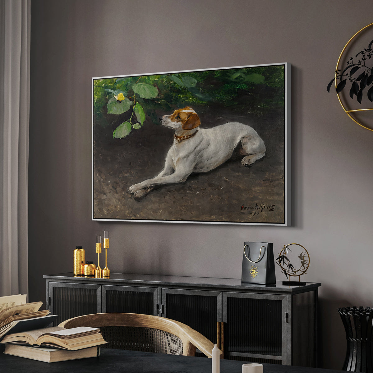 Portrait of a Dog, 1891 by Bruno Liljefors in a white floater framed canvas featuring an animal painting of dog stretched out on earthy terrain, displayed above a desk in a dark home office interior.