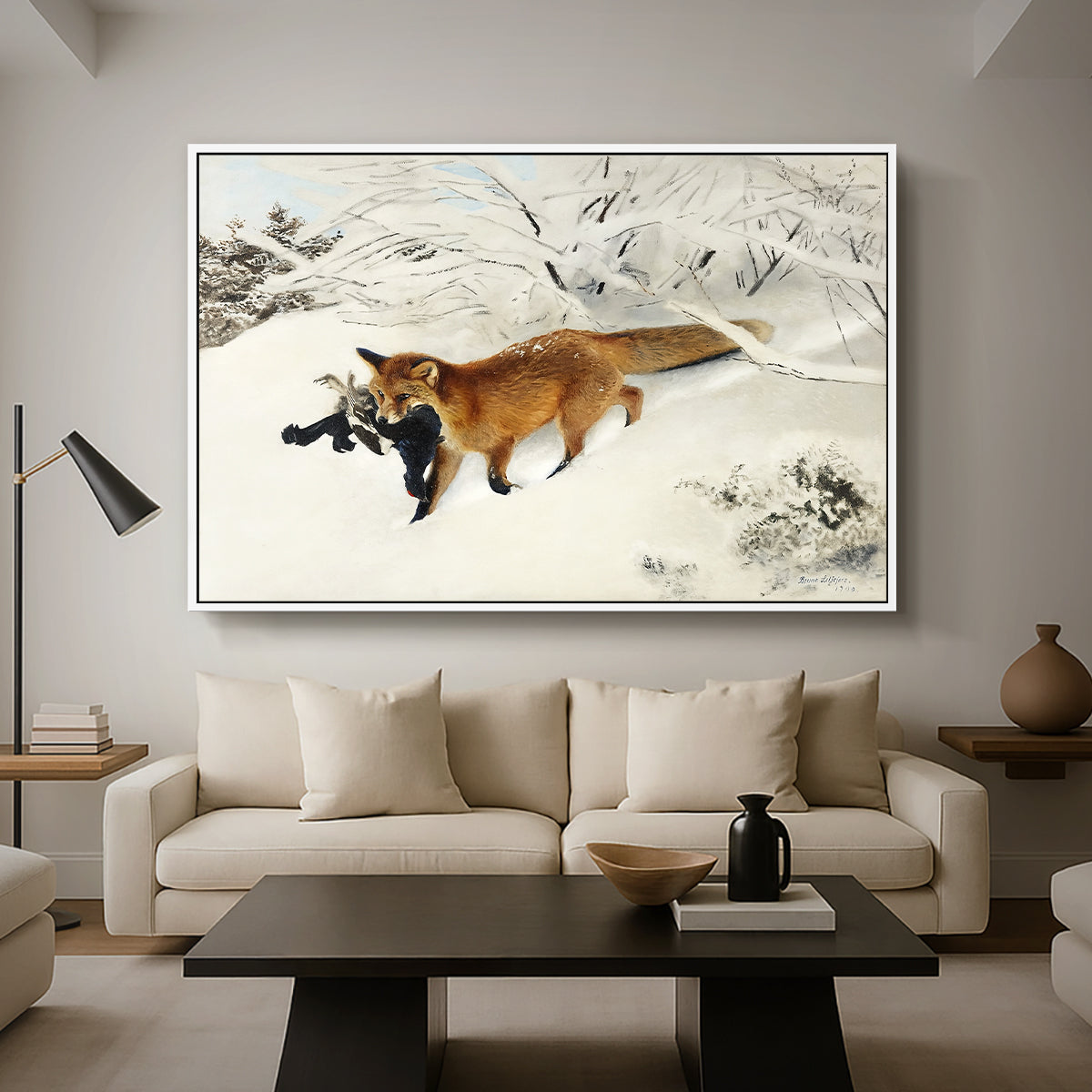 Fox in Snow Landscape, 1900 by Bruno Liljefors as a white floater framed canvas featuring a fox running across snowy landscape with sparse vegetation, displayed above a sofa in a modern living room.