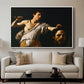 David with the Head of Goliath (Vienna Version), c. 1607 by Caravaggio displayed in a white floater framed canvas above a sofa in a clean living room.