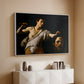 White floater framed canvas of David with the Head of Goliath (Vienna Version), c. 1607 by Caravaggio, featuring a biblical scene of David gripping Goliath's head with dramatic lighting above a console cabinet in a minimalist entryway.