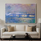 Charing Cross Bridge, 1903 by Claude Monet displayed in a white floater framed canvas above a sofa in a clean living room.