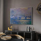 Charing Cross Bridge, 1903 by Claude Monet in a white floater framed canvas featuring an atmospheric depiction of London bridge with reflections in water, displayed above a desk in a dark home office interior.