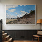 White floater framed canvas featuring a coastal landscape with boats and people along shore, displayed in a hallway near a staircase.