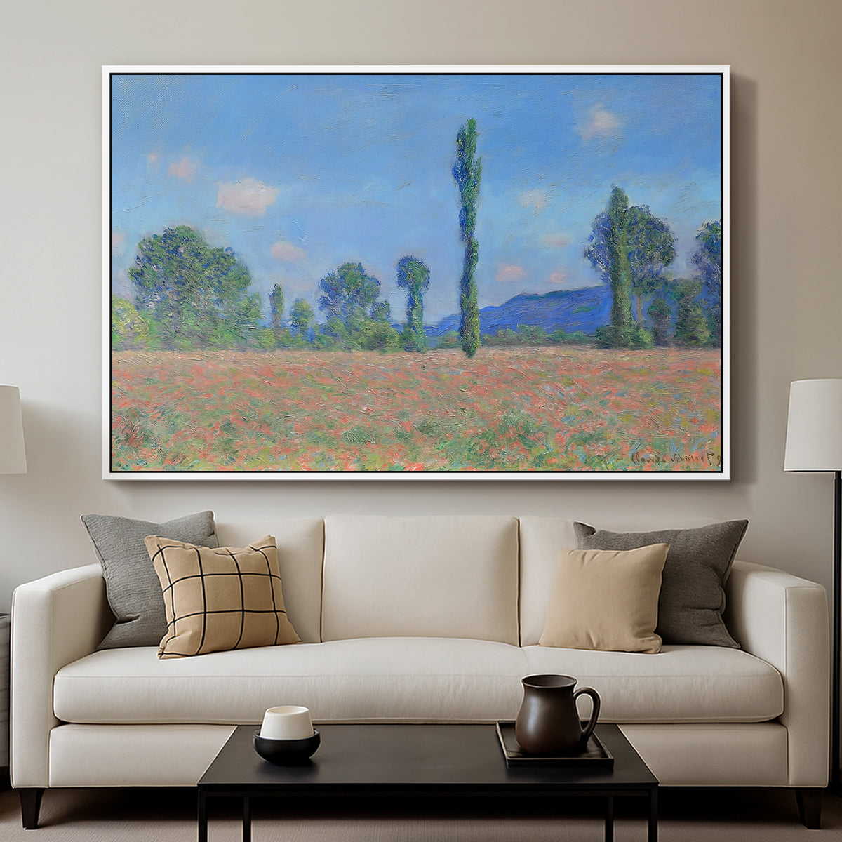 Poppy Field (Giverny), 1890-1891 by Claude Monet displayed in a white floater framed canvas above a sofa in a clean living room.