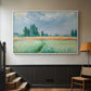 White floater framed canvas featuring a serene rural scene with textured wheat under natural light, displayed in a hallway near a staircase.