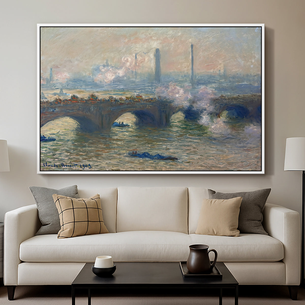 Waterloo Bridge, Gray Day, 1903 by Claude Monet displayed in a white floater framed canvas above a sofa in a clean living room.