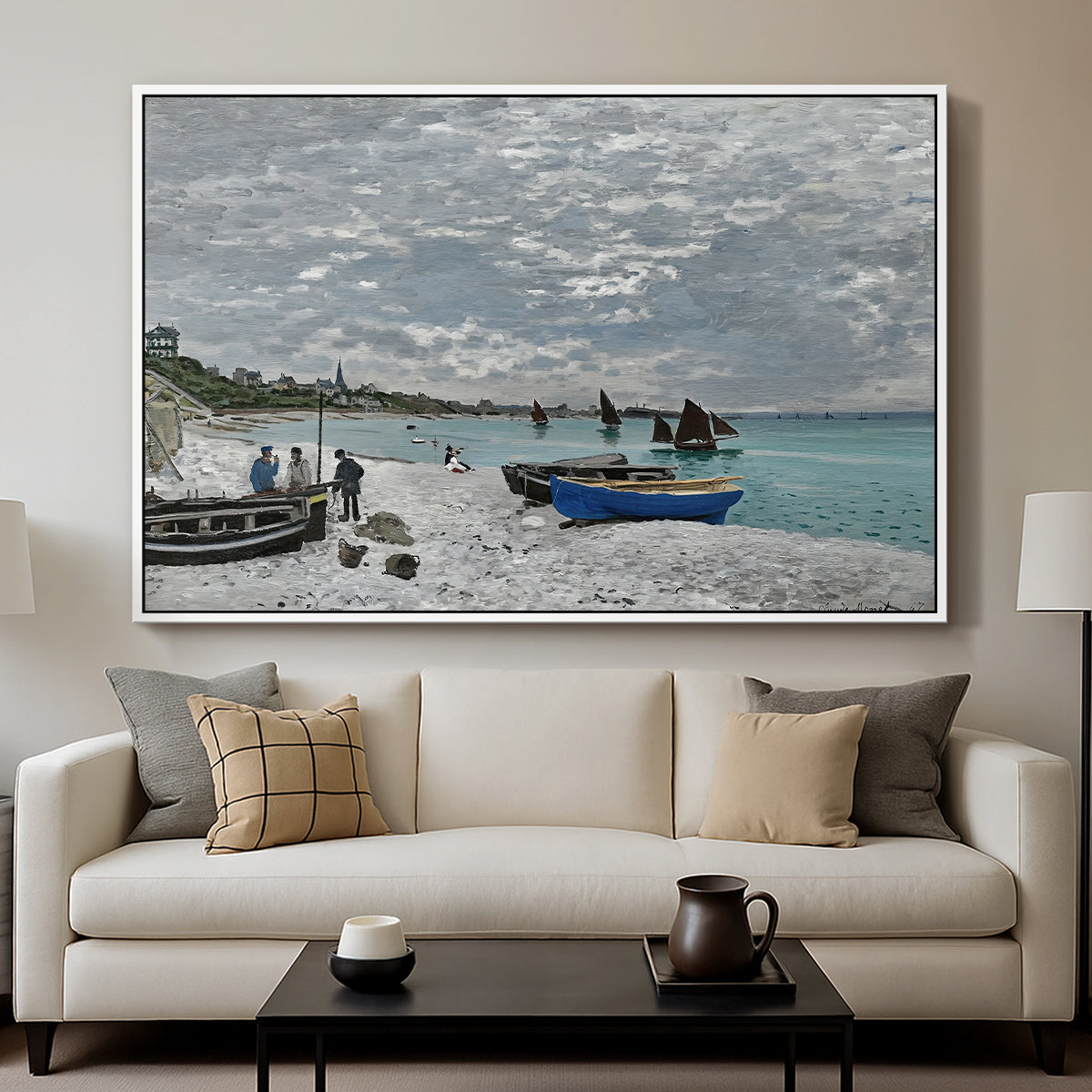 The Beach at Sainte-Adresse, 1867 by Claude Monet displayed in a white floater framed canvas above a sofa in a clean living room.