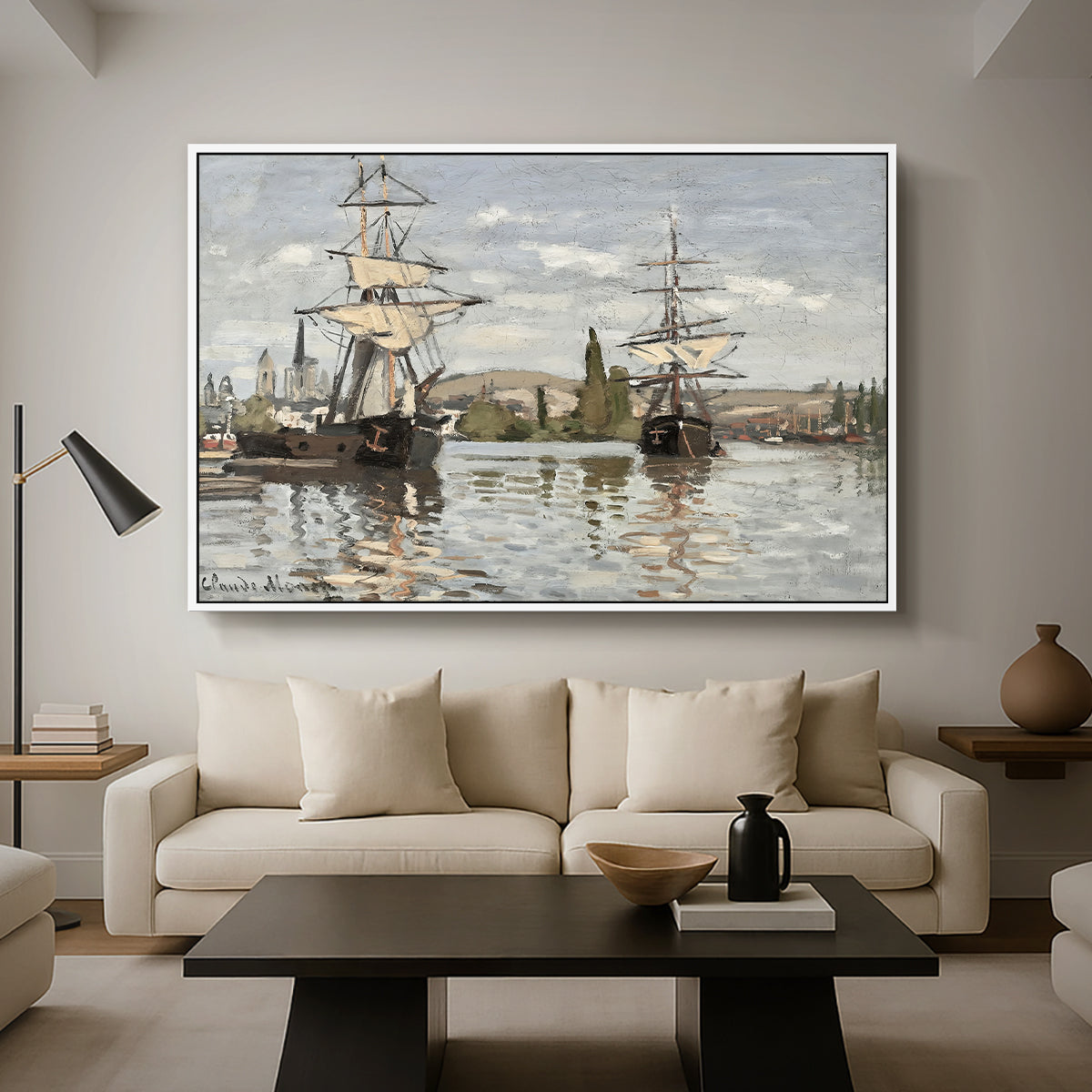 Ships Riding on the Seine at Rouen, 1872 by Claude Monet as a white floater framed canvas featuring large ships docked along the Seine with masts rising against soft sky, displayed above a sofa in a modern living room.