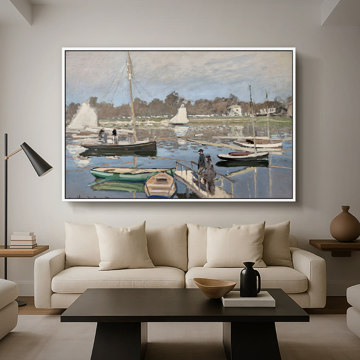 The Basin at Argenteuil, 1874 by Claude Monet as a white floater framed canvas featuring sailboats gathered in calm basin with reflections on water, displayed above a sofa in a modern living room.