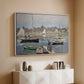 White floater framed canvas of The Basin at Argenteuil, 1874 by Claude Monet, featuring an impressionist boating scene with clustered masts and gentle ripples above a console cabinet in a minimalist entryway.