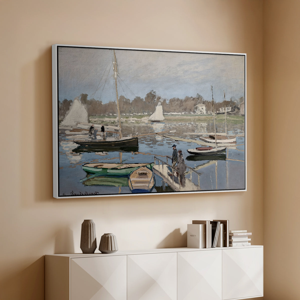 White floater framed canvas of The Basin at Argenteuil, 1874 by Claude Monet, featuring an impressionist boating scene with clustered masts and gentle ripples above a console cabinet in a minimalist entryway.