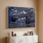White floater framed canvas of A Seascape, Shipping by Moonlight, 1864 by Claude Monet, featuring a nocturnal seascape with boats silhouetted against glowing moon above a console cabinet in a minimalist entryway.