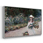 Angled view of Young Girl in the Garden at Giverny, 1888 by Claude Monet in a white floater framed canvas.