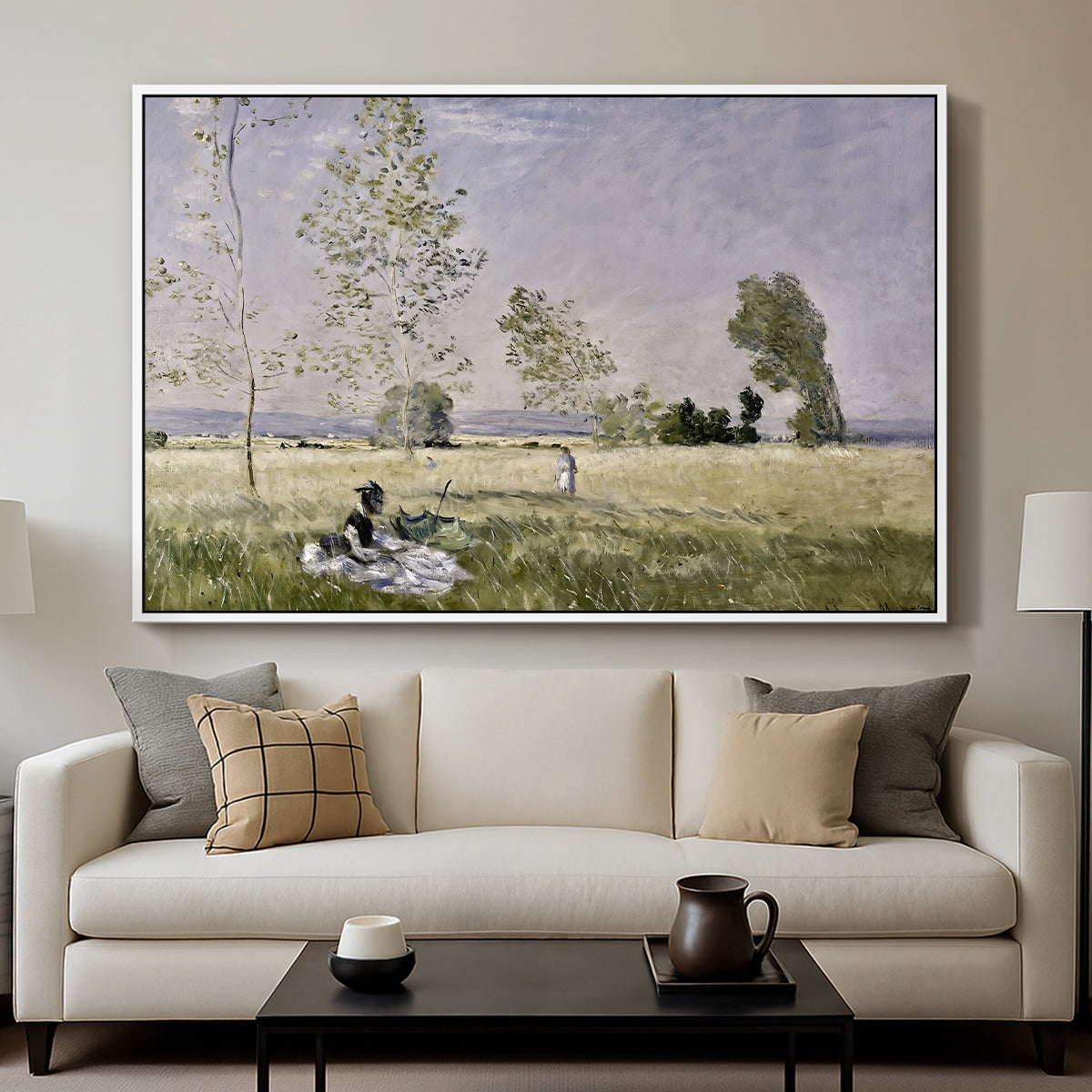 Summer (L'ete), 1874 by Claude Monet displayed in a white floater framed canvas above a sofa in a clean living room.