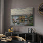 Bridge at Argenteuil on a Gray Day, c. 1876 by Claude Monet in a white floater framed canvas featuring a calm water scene with bridge fading into cloudy sky, displayed above a desk in a dark home office interior.