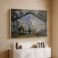 White floater framed canvas of The Gare Saint-Lazare, 1877 by Claude Monet, featuring an impressionist scene of trains and smoke inside busy railway station above a console cabinet in a minimalist entryway.