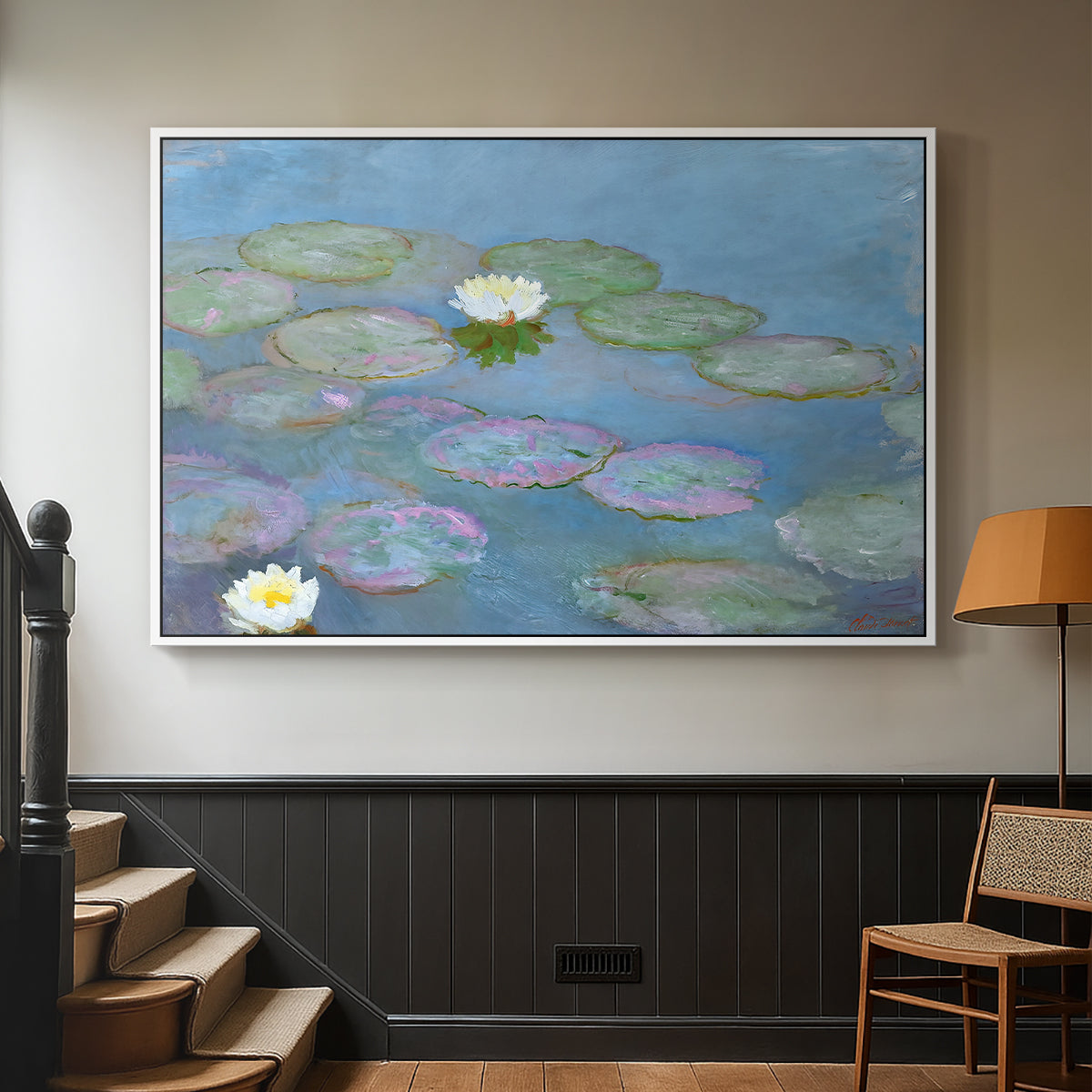 White floater framed canvas featuring a close-up of aquatic plants in still water, displayed in a hallway near a staircase.