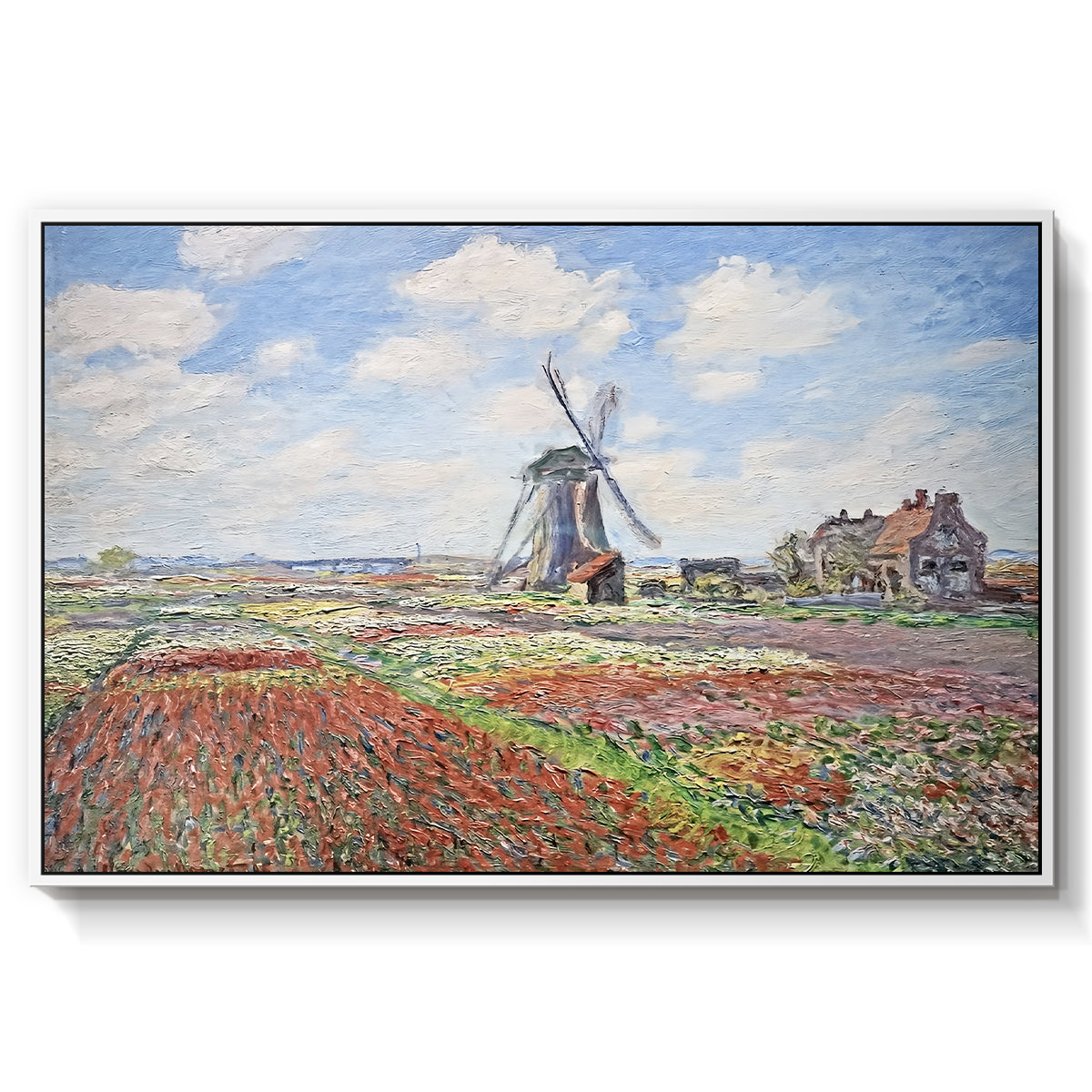 Tulip Fields with the Rijnsburg Windmill, 1886 by Claude Monet in a white floater framed canvas wall art display.