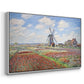 Angled view of Tulip Fields with the Rijnsburg Windmill, 1886 by Claude Monet in a white floater framed canvas.