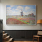 White floater framed canvas featuring a rural scene with patterned rows of flowers and windmill, displayed in a hallway near a staircase.