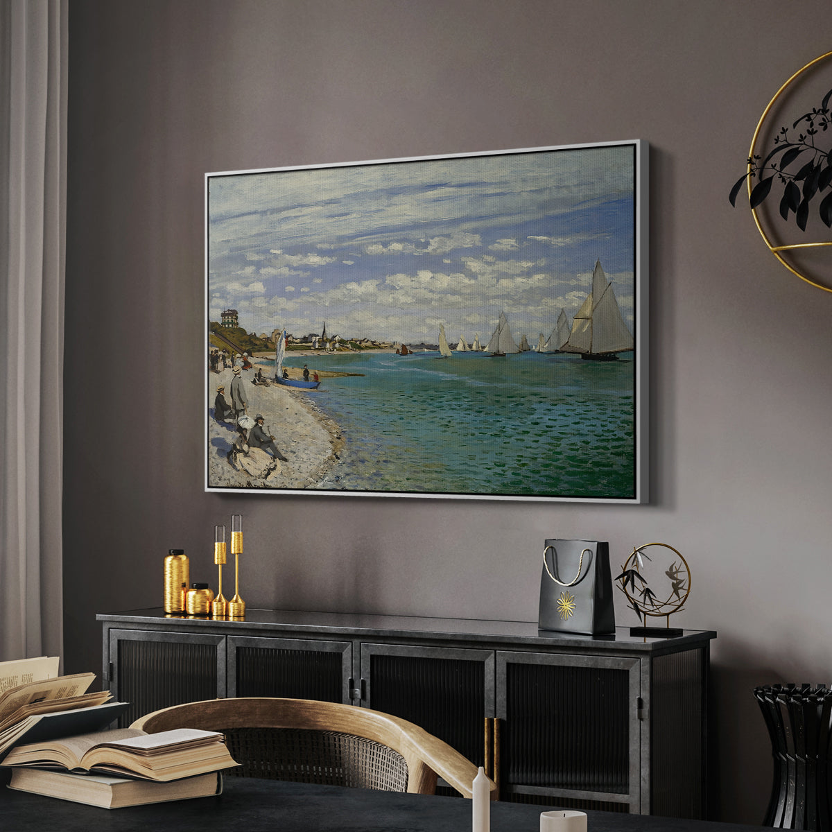 Regatta at Sainte-Adresse, 1867 by Claude Monet in a white floater framed canvas featuring an impressionist coastal view with colorful sails and shoreline activity, displayed above a desk in a dark home office interior.