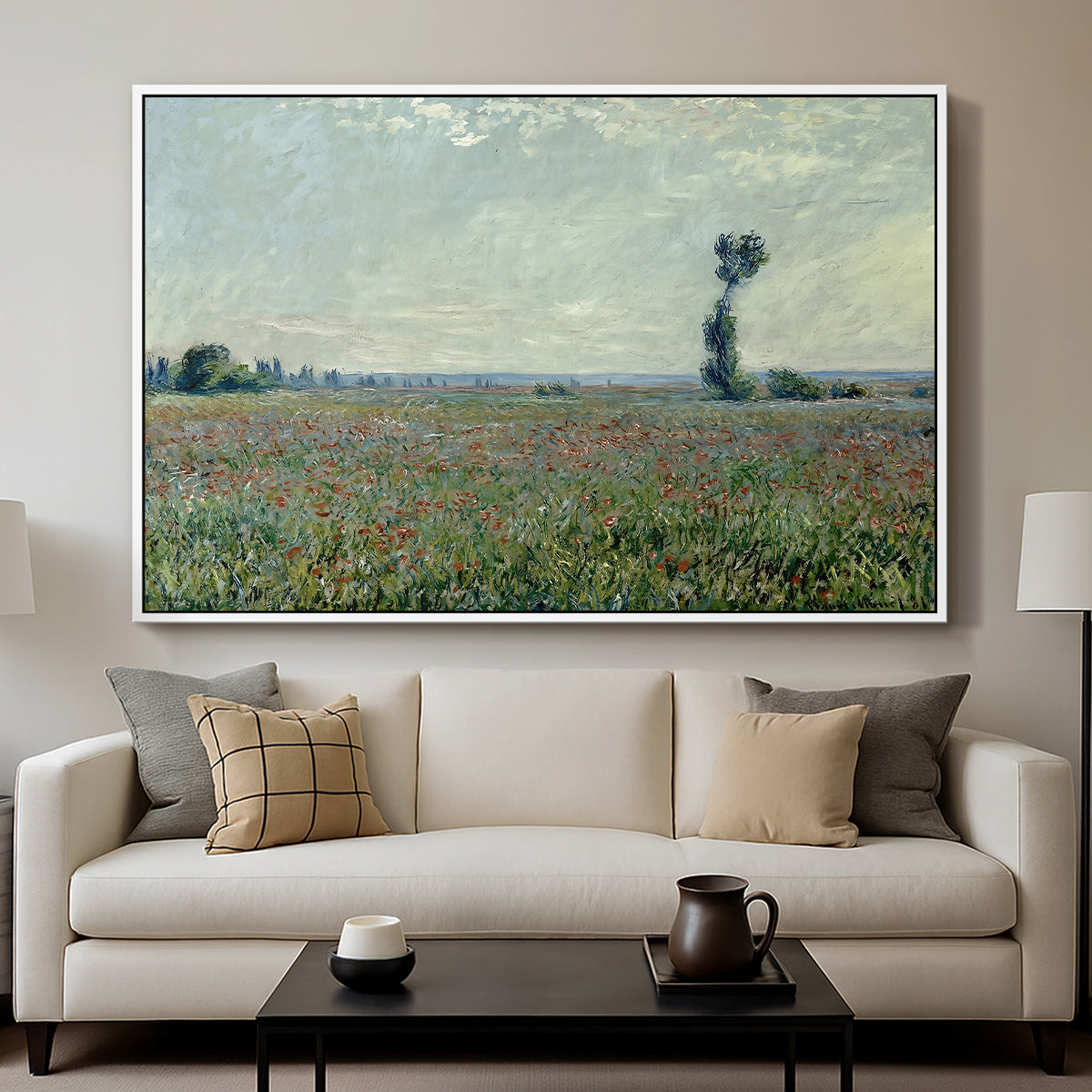 Poppy Field, 1881 by Claude Monet displayed in a white floater framed canvas above a sofa in a clean living room.
