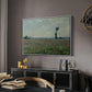 Poppy Field, 1881 by Claude Monet in a white floater framed canvas featuring a rural meadow with scattered poppies and soft horizon, displayed above a desk in a dark home office interior.