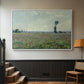 White floater framed canvas featuring a natural field scene with vibrant red flowers, displayed in a hallway near a staircase.