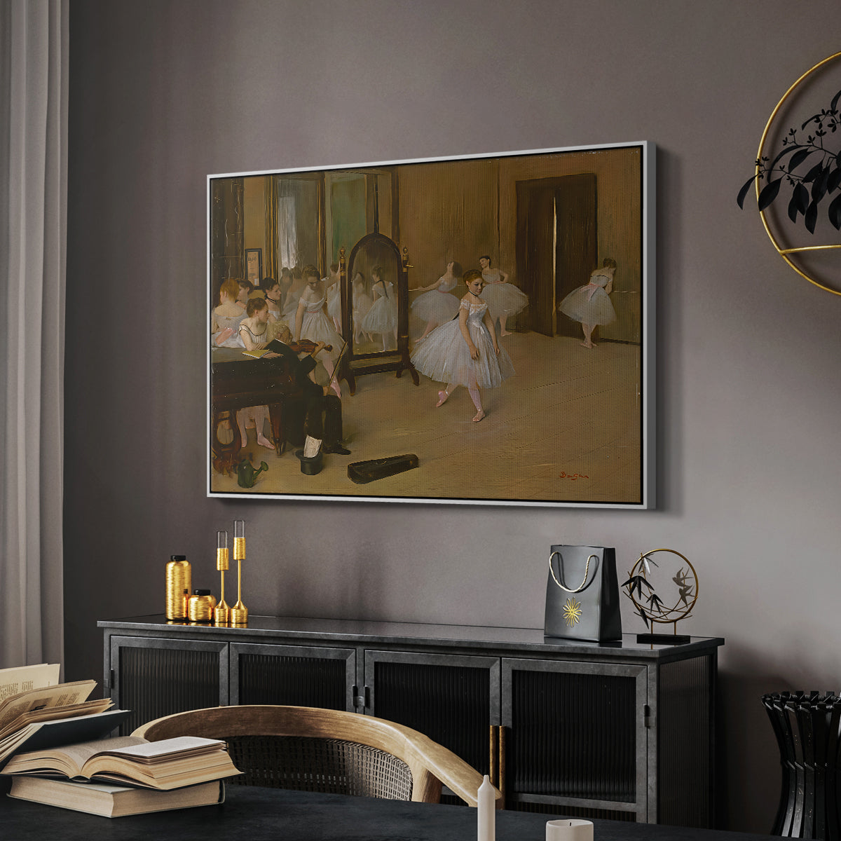 The Dancing Class, c. 1870 by Edgar Degas in a white floater framed canvas featuring an impressionist interior capturing movement and discipline of dancers, displayed above a desk in a dark home office interior.