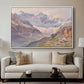 Odenwinklkees with the Johannisberg, 1902 by Edward Theodore Compton displayed in a white floater framed canvas above a sofa in a clean living room.
