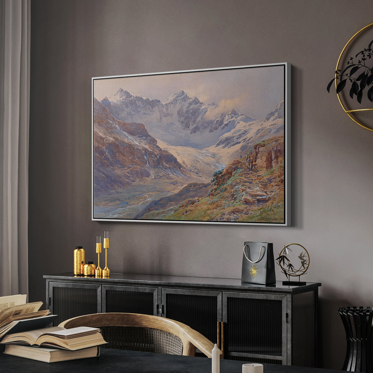 Odenwinklkees with the Johannisberg, 1902 by Edward Theodore Compton in a white floater framed canvas featuring a realistic depiction of high-altitude snowy peaks, displayed above a desk in a dark home office interior.