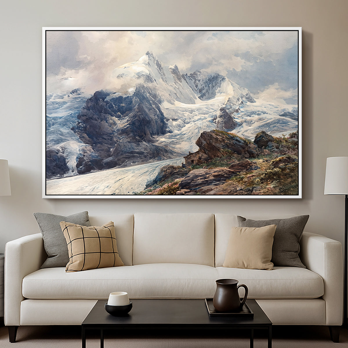 The Grossglockner, 1880 by Edward Theodore Compton displayed in a white floater framed canvas above a sofa in a clean living room.
