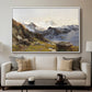The Großglockner from the Prager Hut, 1890 by Edward Theodore Compton displayed in a white floater framed canvas above a sofa in a clean living room.