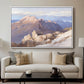 Hoher Göll from Watzmann-Hocheck, 1919 by Edward Theodore Compton displayed in a white floater framed canvas above a sofa in a clean living room.