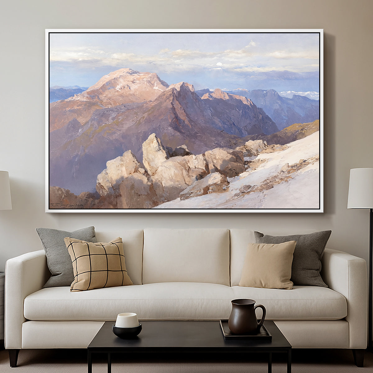 Hoher Göll from Watzmann-Hocheck, 1919 by Edward Theodore Compton displayed in a white floater framed canvas above a sofa in a clean living room.