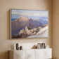 White floater framed canvas of Hoher Göll from Watzmann-Hocheck, 1919 by Edward Theodore Compton, featuring an alpine panorama showing layered peaks and valleys above a console cabinet in a minimalist entryway.