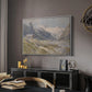 Shepherds (Pasterze), c. 1921 by Edward Theodore Compton in a white floater framed canvas featuring a rural alpine setting with shepherds and open terrain, displayed above a desk in a dark home office interior.