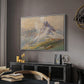 From the Dolomites, 1904 by Edward Theodore Compton in a white floater framed canvas featuring an expansive landscape featuring iconic Dolomite peaks, displayed above a desk in a dark home office interior.