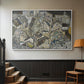White floater framed canvas featuring a stylized urban composition with geometric structures and muted tones, displayed in a hallway near a staircase.
