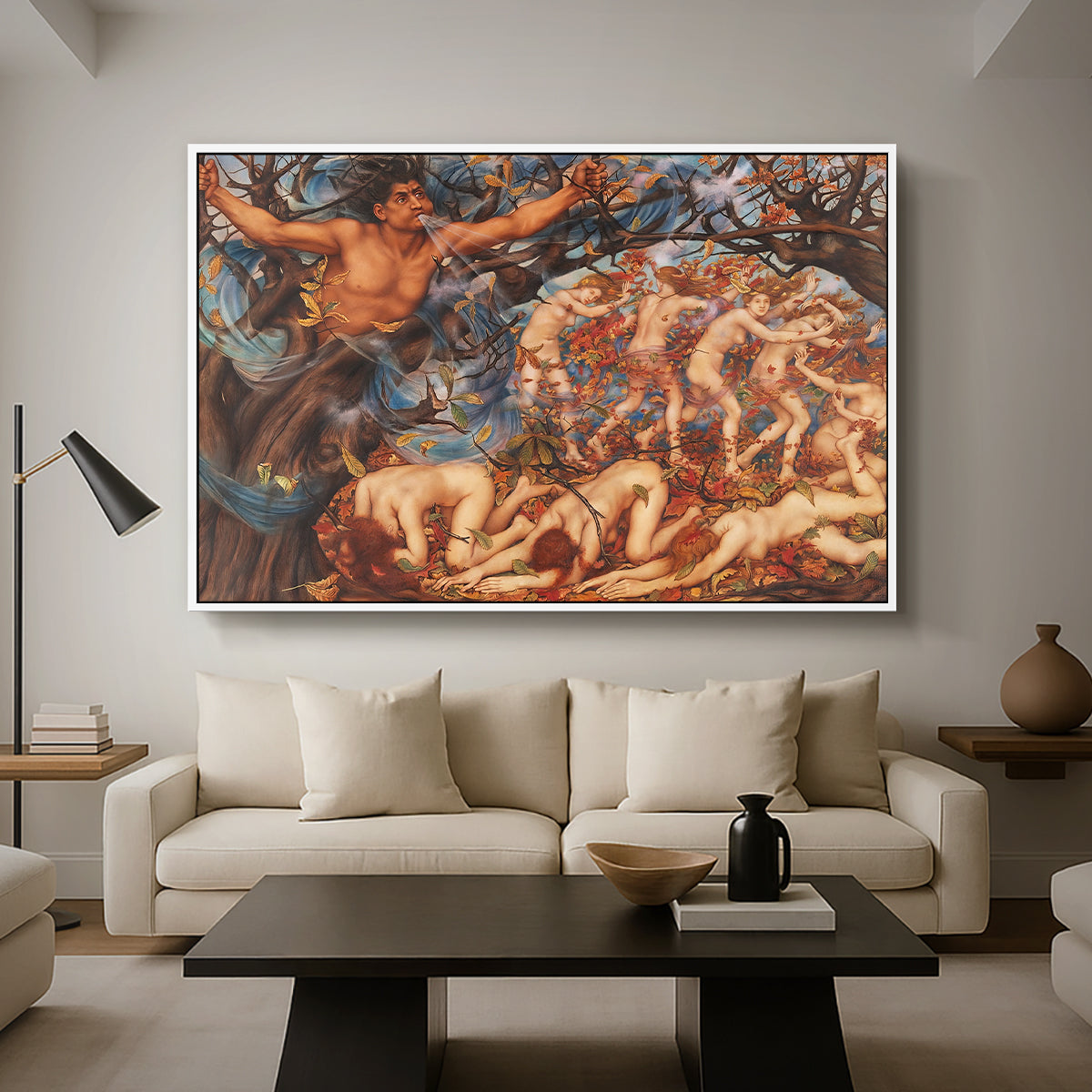 Boreas and the Fallen Leaves, c. 1910-1914 by Evelyn De Morgan as a white floater framed canvas featuring swirling figures carried by wind among falling leaves in dynamic composition, displayed above a sofa in a modern living room.