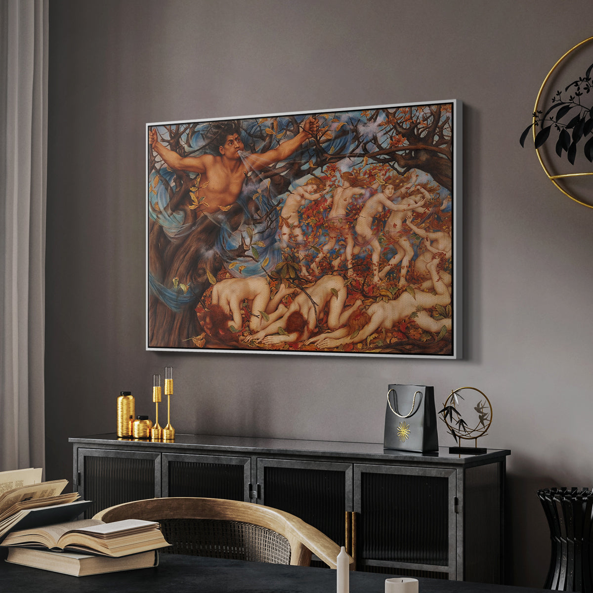 Boreas and the Fallen Leaves, c. 1910-1914 by Evelyn De Morgan in a white floater framed canvas featuring an energetic depiction of figures swept through air by wind, displayed above a desk in a dark home office interior.