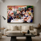 Luncheon of the Boating Party (Le Déjeuner des canotiers), 1880-1881 by Pierre-Auguste Renoir as a gold floater framed canvas featuring a group of elegantly dressed people dining together on a sunlit balcony overlooking the river, displayed above a sofa in a modern living room.